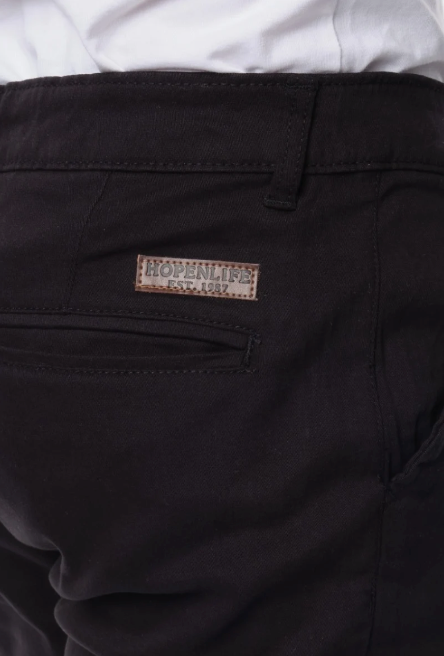 Pantalon chino poches fendues uni homme Noir