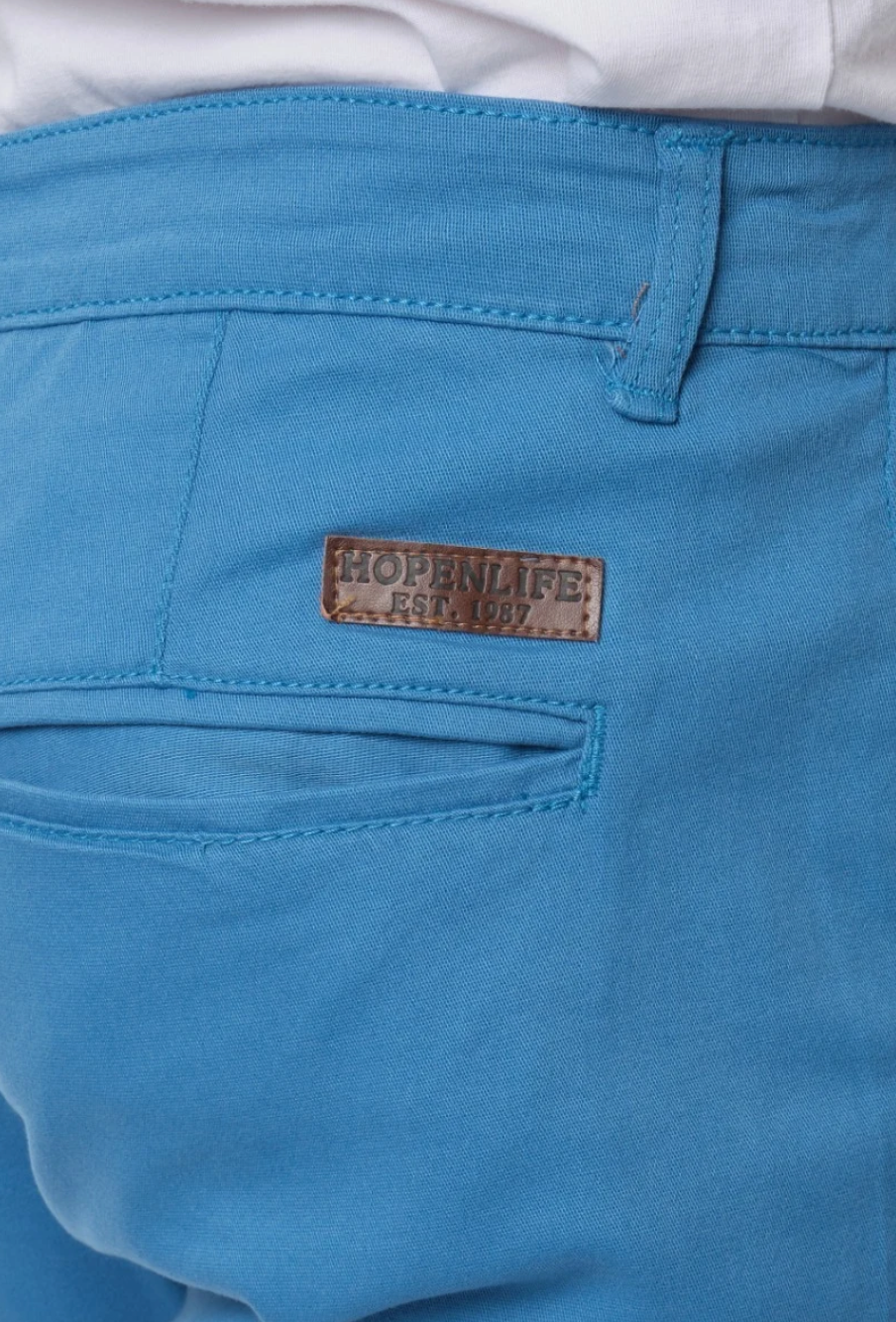 Pantalon chino poches fendues uni homme Bleu